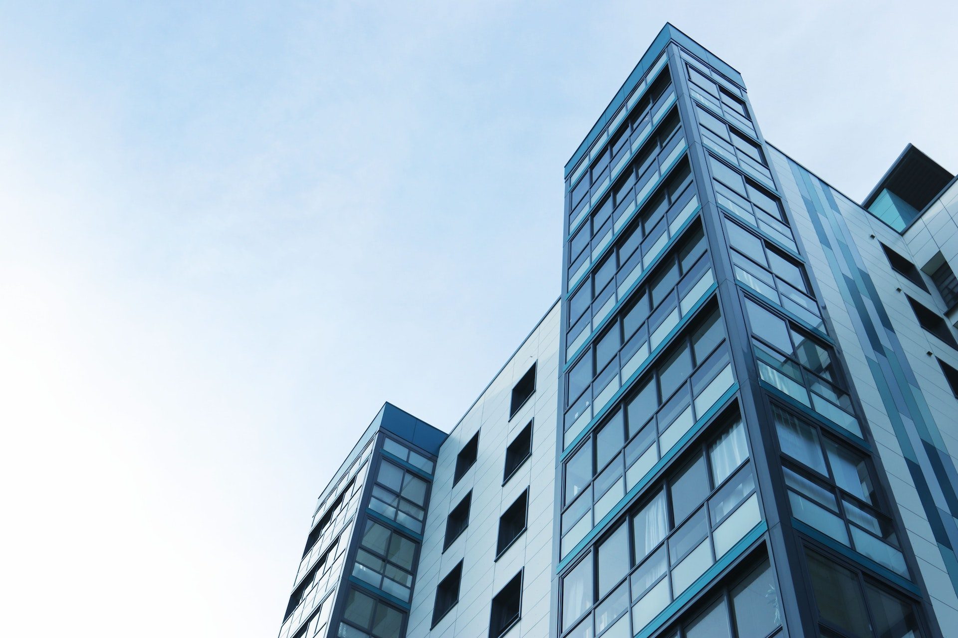 Low Angle View of Office Building Against Sky